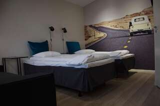 Мотели Autokeidas Forssa Motelli Форсса Двухместный номер с 1 кроватью или 2 отдельными кроватями и ванной комнатой-11